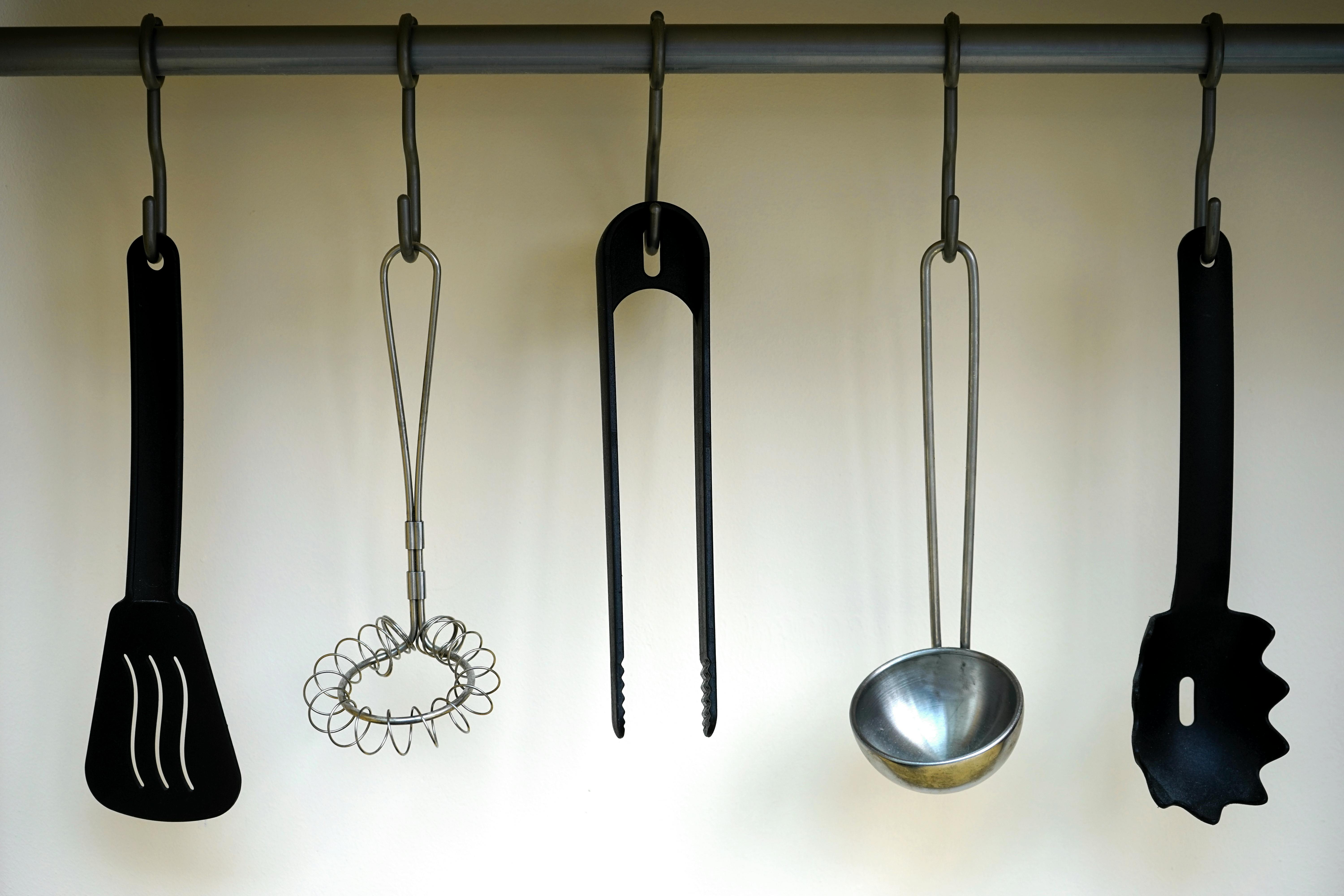 Kitchen tools on wooden countertop